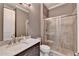 Well-appointed bathroom with a glass-enclosed shower and modern vanity at 828 Olmsted Ln, Duluth, GA 30097