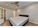Well-lit bedroom with modern fan, closet, new hardwood floors and plenty of natural light at 828 Olmsted Ln, Duluth, GA 30097