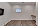 Bright bedroom featuring built in desk, and hardwood floors and natural light at 828 Olmsted Ln, Duluth, GA 30097
