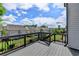 Spacious deck with a lovely view of the neighborhood and surrounding greenery at 828 Olmsted Ln, Duluth, GA 30097