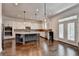 Modern kitchen with stainless appliances, a center island, and light-filled windows at 828 Olmsted Ln, Duluth, GA 30097