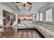 Expansive living room showcasing hardwood floors and an open staircase to the left at 828 Olmsted Ln, Duluth, GA 30097