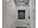 Modern shower features stunning tile work and a convenient built-in shower niche at 828 Olmsted Ln, Duluth, GA 30097