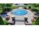 Close-up of splash pad with tables and chairs, perfect for cooling off on a hot day at 828 Olmsted Ln, Duluth, GA 30097