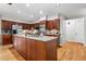 Beautiful kitchen with stainless steel appliances, large island, and wood cabinets at 1075 Winding Branch Ln, Atlanta, GA 30338