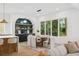 Open dining area with modern furnishings, hardwood floors, and lots of natural light at 1287 Star Ne Dr, Brookhaven, GA 30319