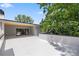 A contemporary rooftop deck features an open sliding glass door and views of the surrounding greenery at 1287 Star Ne Dr, Brookhaven, GA 30319
