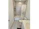 Bathroom featuring a white tub/shower combo with gray tile and white toilet at 150 Holden Way, Woodstock, GA 30189