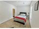 Bright bedroom with cozy carpet, neutral walls, and natural light from a window at 150 Holden Way, Woodstock, GA 30189