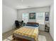 Bedroom featuring a bed with study area and two windows for lots of natural light at 150 Holden Way, Woodstock, GA 30189
