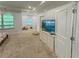 Spacious carpeted bonus room has lots of natural light at 150 Holden Way, Woodstock, GA 30189