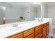 Bathroom featuring double sinks, a large mirror, and a separate soaking tub at 855 Mountain View Nw Ter, Marietta, GA 30064