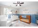 Bedroom featuring a crib, changing table, and comfortable seating, perfect for a new Gathering at 855 Mountain View Nw Ter, Marietta, GA 30064