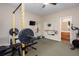 Bright exercise room features workout equipment, mirrored walls, and access to the bathroom at 855 Mountain View Nw Ter, Marietta, GA 30064