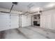 Spacious three car garage with ample storage space and high ceilings at 855 Mountain View Nw Ter, Marietta, GA 30064