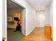 Hallway shows access to exercise room with workout equipment, and several entryways at 855 Mountain View Nw Ter, Marietta, GA 30064