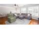 Open living room with hardwood floors and natural light at 855 Mountain View Nw Ter, Marietta, GA 30064
