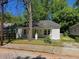 A quaint home features a welcoming porch and neat landscaping at 112 Brown Se Ave, Atlanta, GA 30315