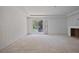 Bright living room featuring fireplace, natural light, and slider door at 1410 Lavista Ne Rd, Atlanta, GA 30324