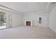 Living room featuring fireplace, natural light, and open layout at 1410 Lavista Ne Rd, Atlanta, GA 30324