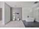 Elegant bathroom with a freestanding tub, toilet, bidet, and modern finishes at 1410 Lavista Ne Rd, Atlanta, GA 30324