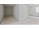 A bright, empty room with tile floors offers possibilities for a custom design at 1410 Lavista Ne Rd, Atlanta, GA 30324