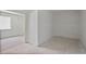 A bright, empty room with tile floors offers possibilities for a custom design at 1410 Lavista Ne Rd, Atlanta, GA 30324