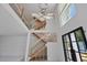 Interior view of a new home featuring unfinished staircase and large front windows at 1410 Lavista Ne Rd, Atlanta, GA 30324