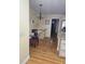 Inviting dining area next to an open staircase with gleaming hardwood floors at 2379 Manassas Ln, Decatur, GA 30034