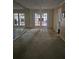 Dining room featuring neutral walls, mirrored wall, and access to backyard at 2379 Manassas Ln, Decatur, GA 30034