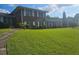 Inviting brick home with a spacious green lawn and mature landscaping at 2379 Manassas Ln, Decatur, GA 30034