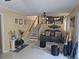 Relax in this cozy living room with a staircase, ceiling fan, and comfortable seating at 2379 Manassas Ln, Decatur, GA 30034