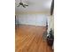 Bright living room featuring hardwood floors, fireplace, and ample closet space at 2379 Manassas Ln, Decatur, GA 30034