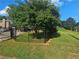 A lush front yard is enclosed by a sleek, black metal fence providing security and curb appeal at 2379 Manassas Ln, Decatur, GA 30034