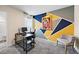 Contemporary office space featuring a unique painted accent wall and functional workstation at 2440 Rocky City Ln, Snellville, GA 30078