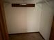 Empty closet features a shelf and rod for storage at 108 Fair Oaks Se Dr, Conyers, GA 30094