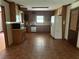 Spacious kitchen with wooden cabinets, laminate countertops, and appliances at 108 Fair Oaks Se Dr, Conyers, GA 30094