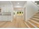 Bright open entryway showcasing the stairs and a glimpse of the living room at 1870 Twin Branch Dr, Marietta, GA 30062