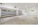 Spacious garage with two doors, recessed lighting, and ample room for vehicles and storage at 1870 Twin Branch Dr, Marietta, GA 30062