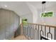 Staircase with decorative railing, natural light and architectural wall design at 1870 Twin Branch Dr, Marietta, GA 30062