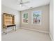 Bedroom with neutral walls, carpet, ceiling fan, and bright natural light at 5882 Riverstone Cir # 15, Atlanta, GA 30339