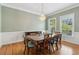 Formal dining room with hardwood floors, crown molding, and a beautiful chandelier, perfect for entertaining guests at 5882 Riverstone Cir # 15, Atlanta, GA 30339