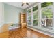 Bright home office featuring large windows, hardwood floors, and custom built-ins, perfect for remote work at 5882 Riverstone Cir # 15, Atlanta, GA 30339