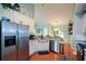Well-maintained kitchen featuring modern stainless steel appliances and white cabinetry at 9013 Aldbury Dr, Locust Grove, GA 30248