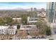 Great aerial view showing the building's location with city skyline views, close to other buildings at 91 Rumson Rd, Atlanta, GA 30305