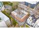 Building's aerial view highlighting its location near other buildings and the surrounding city at 91 Rumson Rd, Atlanta, GA 30305