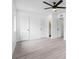 Bedroom showcasing hardwood floors and access to both a bathroom and closet at 91 Rumson Rd, Atlanta, GA 30305