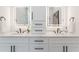 Bright bathroom boasts double vanity with modern lighting, sleek fixtures, and plenty of storage space at 138 Beutell St, Norcross, GA 30071