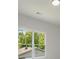 Bright bedroom with large windows offering verdant views at 138 Beutell St, Norcross, GA 30071