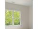 Bright bedroom with large windows looking to greenery at 138 Beutell St, Norcross, GA 30071